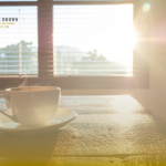 A photo of a morning coffee on a desk.